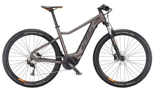 Rower KTM MACINA RACE Rozmiar M w kolorze brązowo-złotym, ujęcie roweru od boku
