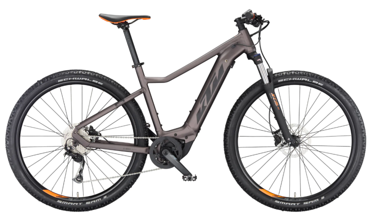 Rower KTM MACINA RACE Rozmiar L w kolorze brązowo-złotym, ujęcie roweru od boku